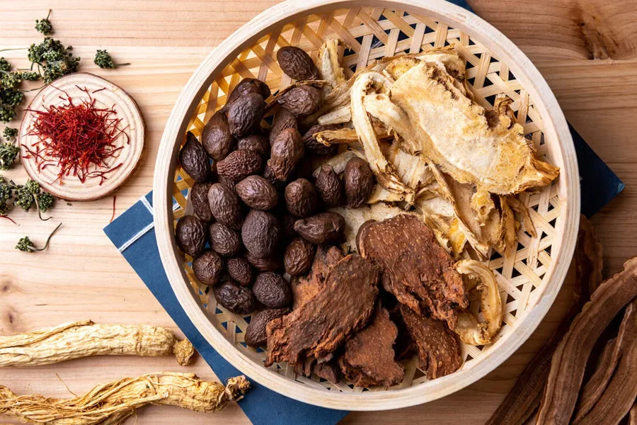 Chinese herbs in a bamboo basket